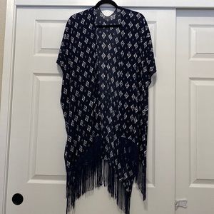 Dark blue and white cover/shawl